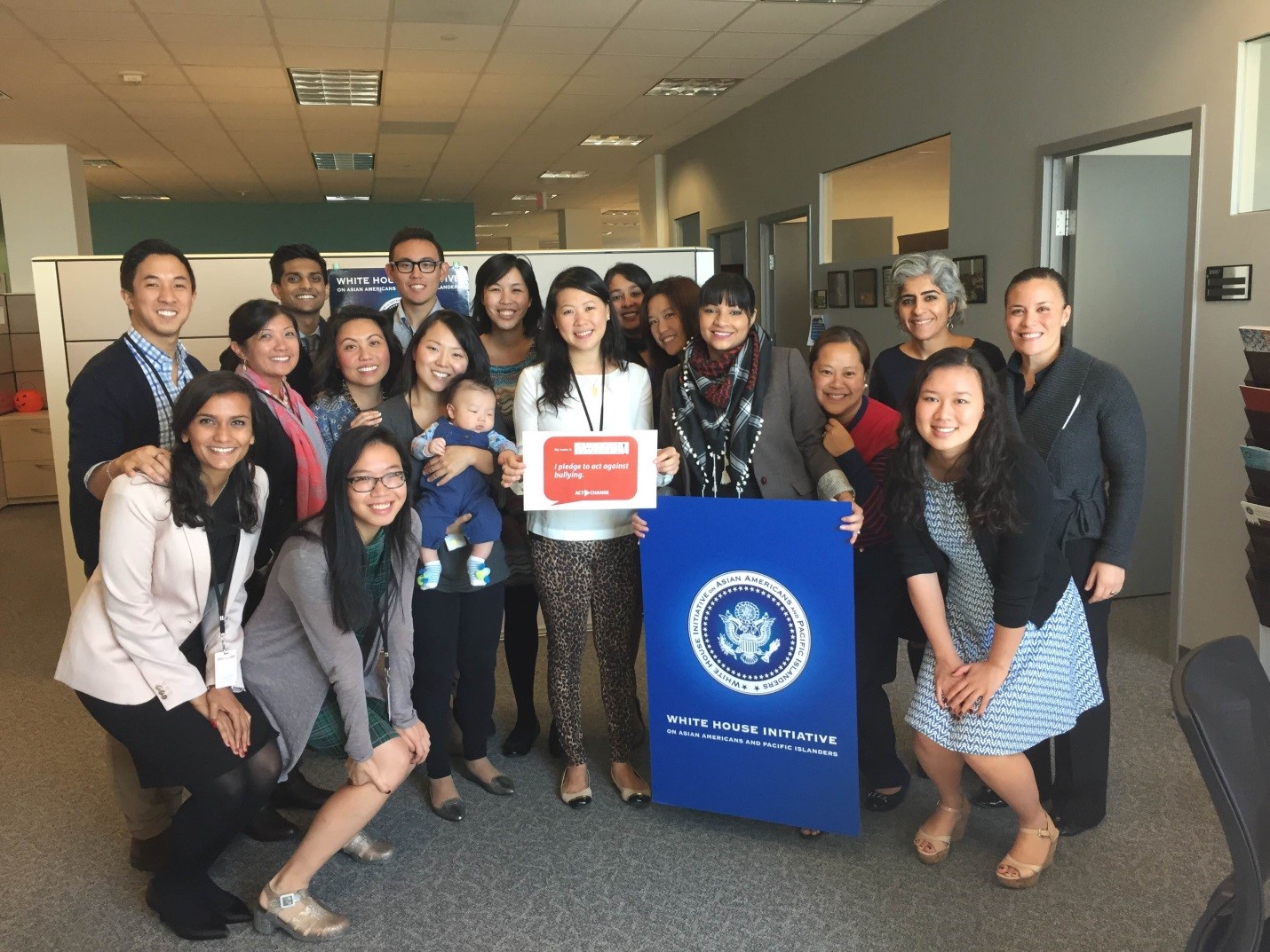 Staff of the White House Initiative on Asian Americans and Pacific Islanders show their support for #ActToChange, a public awareness campaign to combat bullying, October 21, 2015.