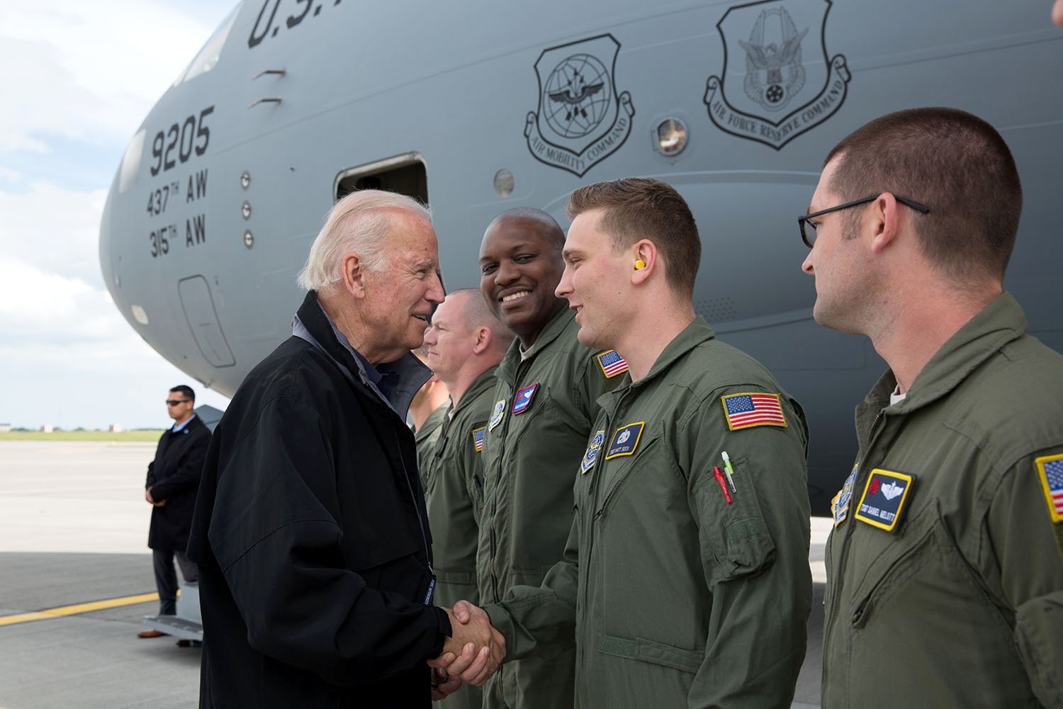 Vice President Joe Biden shakes hands with crew members outside a C-17 serving as Air Force Two, at Dublin International Airport, in Dublin Ireland, June 23, 2016. (Official White House Photo by David Lienemann)
