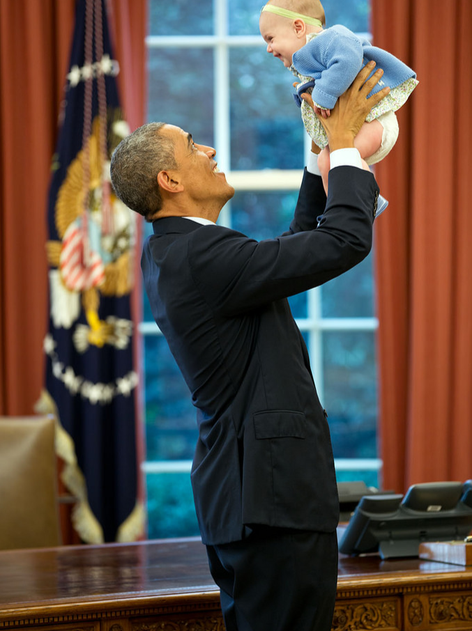 President Obama with a child.
