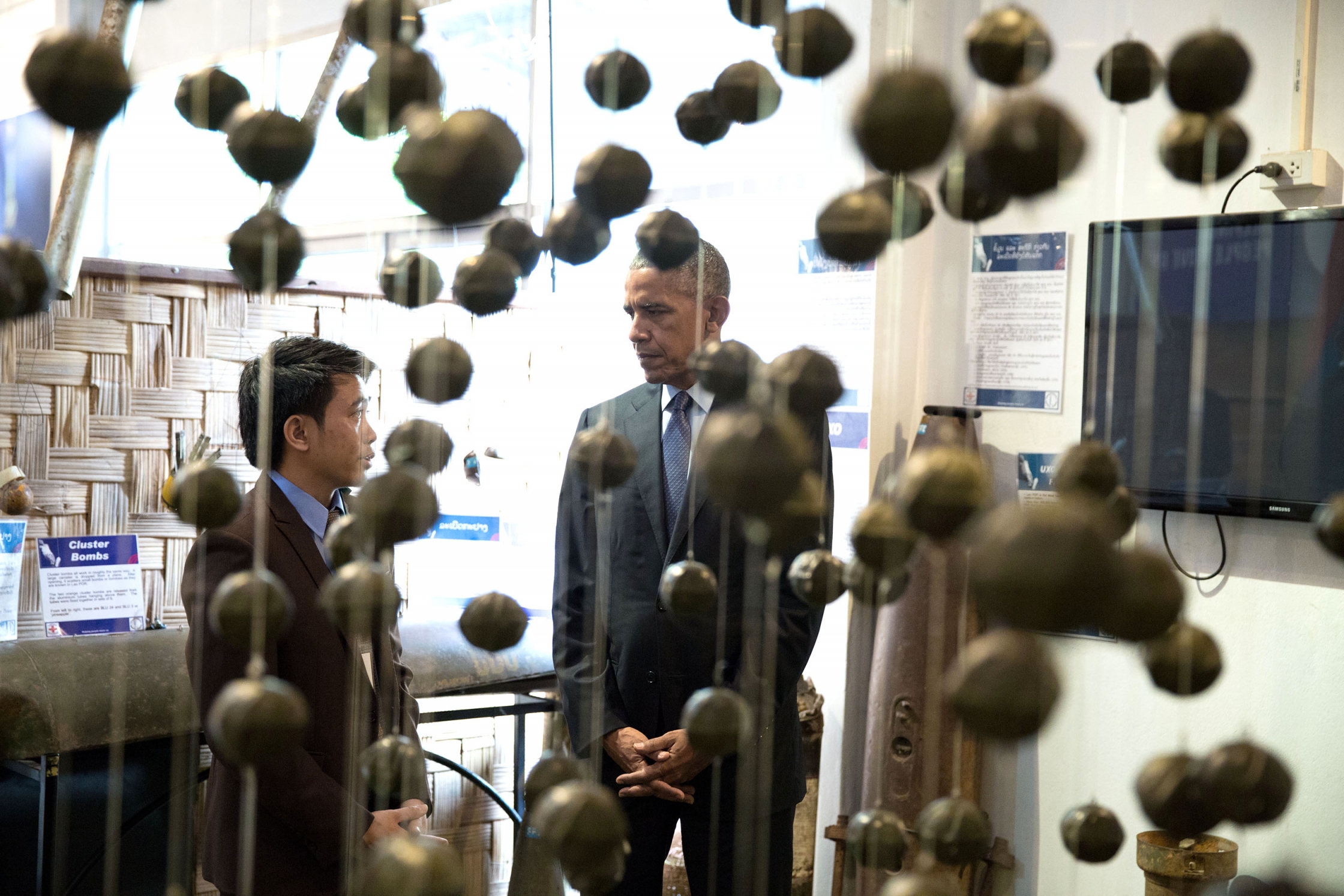 President Barack Obama meets with unexploded ordnance survivor Thoummy Silamphan from the Quality of Life Association, as he tours the Cooperative Orthotic Prosthetic Enterprise (COPE) Visitor Centre to meet with unexploded ordnance clearance teams and survivors of blasts, in Vientiane, Laos.