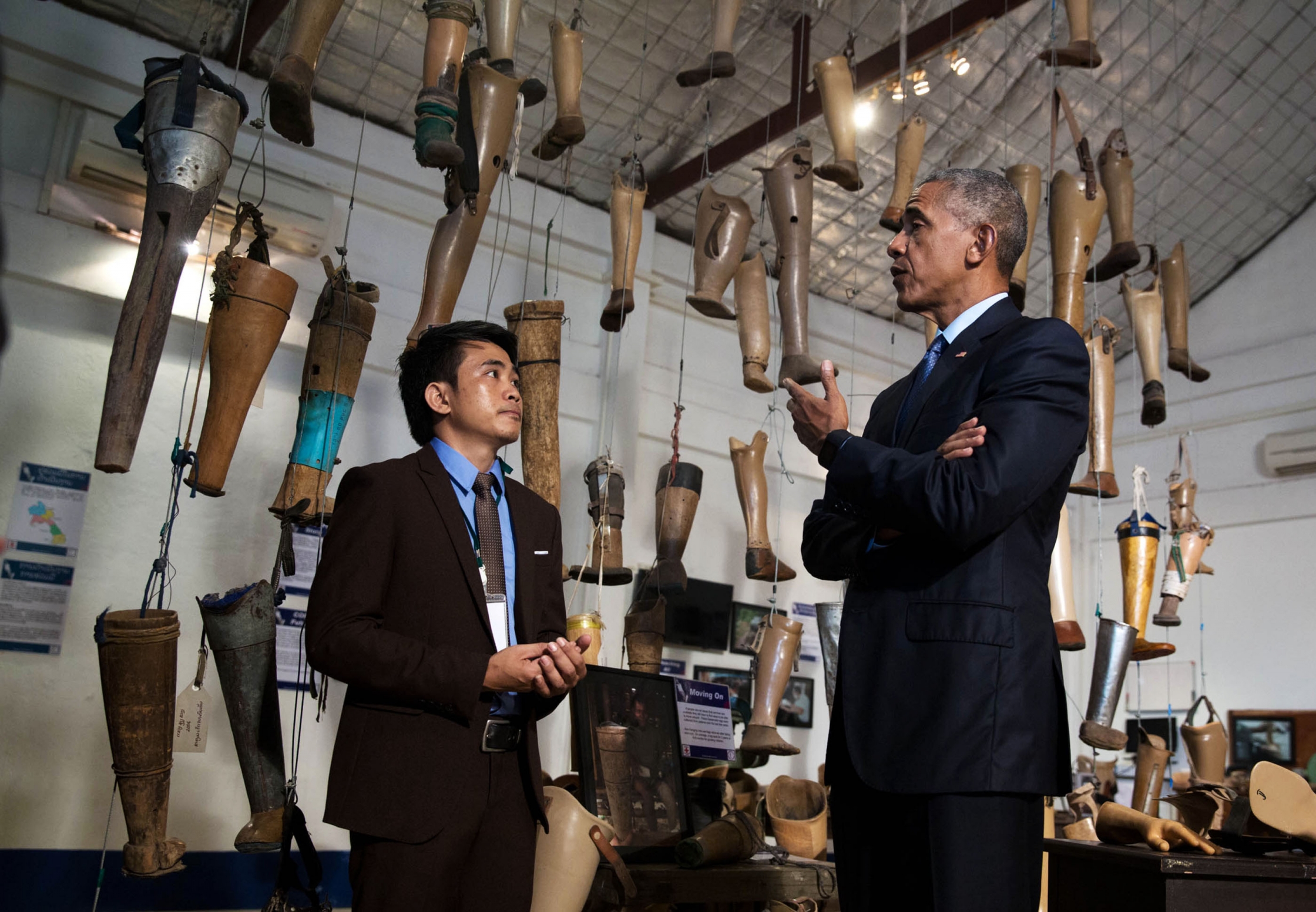 President Barack Obama meets with unexploded ordnance survivor Thoummy Silamphan from the Quality of Life Association, as he tours the Cooperative Orthotic Prosthetic Enterprise (COPE) Visitor Centre to meet with unexploded ordnance clearance teams and survivors of blasts, in Vientiane, Laos, Sept. 7, 2016. (Official White House Photo by Chuck Kennedy)