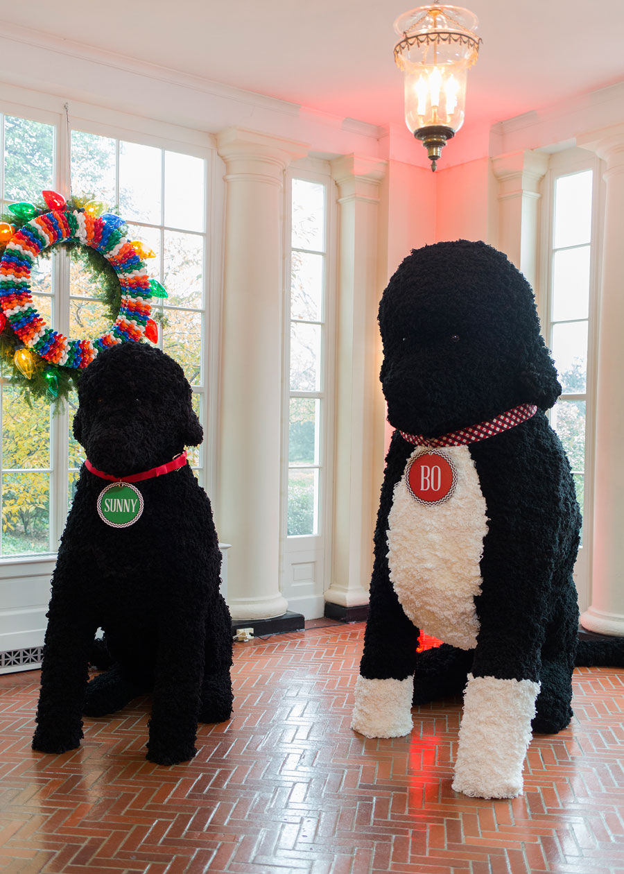 Large representations of the First Family's dogs, Bo and Sunny, stand on the East Landing.