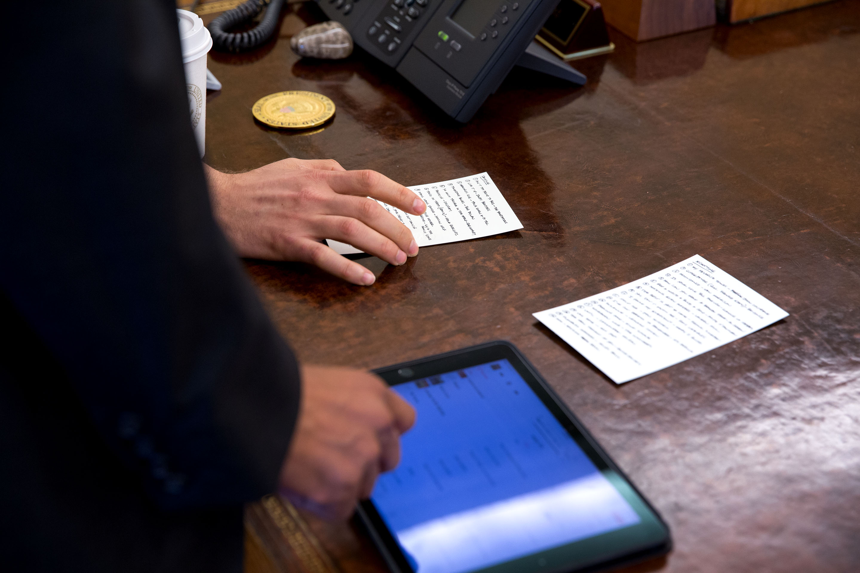 President Obama discusses his summer playlists with Jason Goldman, Chief Digital Officer, in the Oval Office.